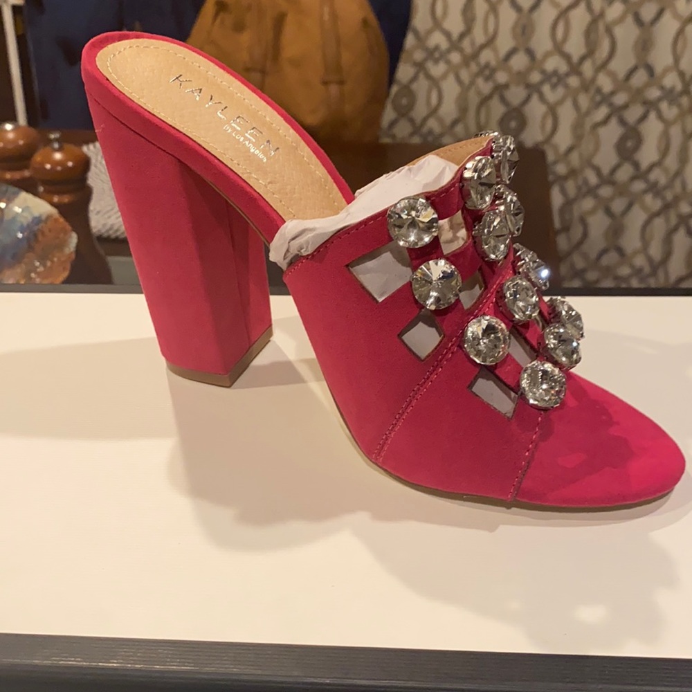 Shine Bright Like a Diamond in these High Heel Rhinestone Fuschia Sandals.